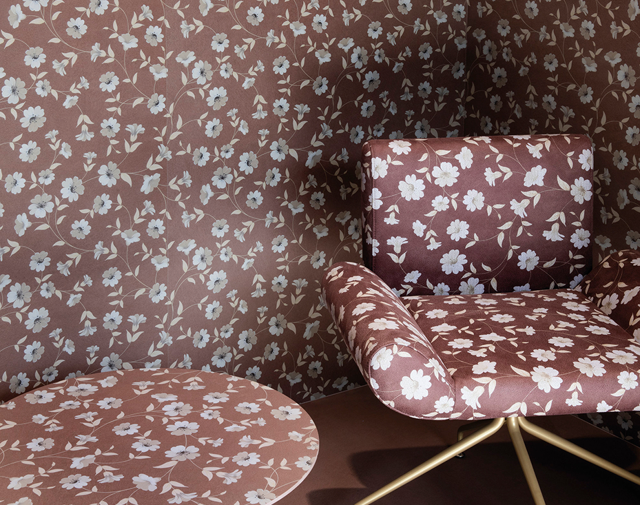 Floral ceramic wall coordinated with armchair and coffee table